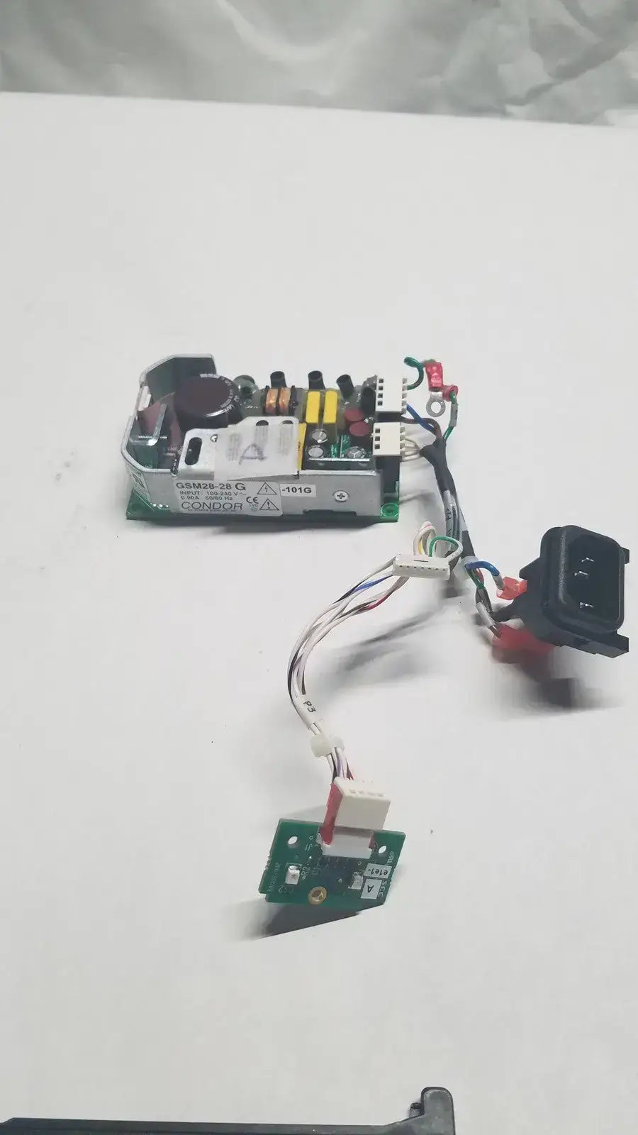 Condor 28 Volt, 0.90 Amp DC Power Supply, Model: GSM28-28G, 100-240VAC Input DC Power Supply, second-hand product photo 1