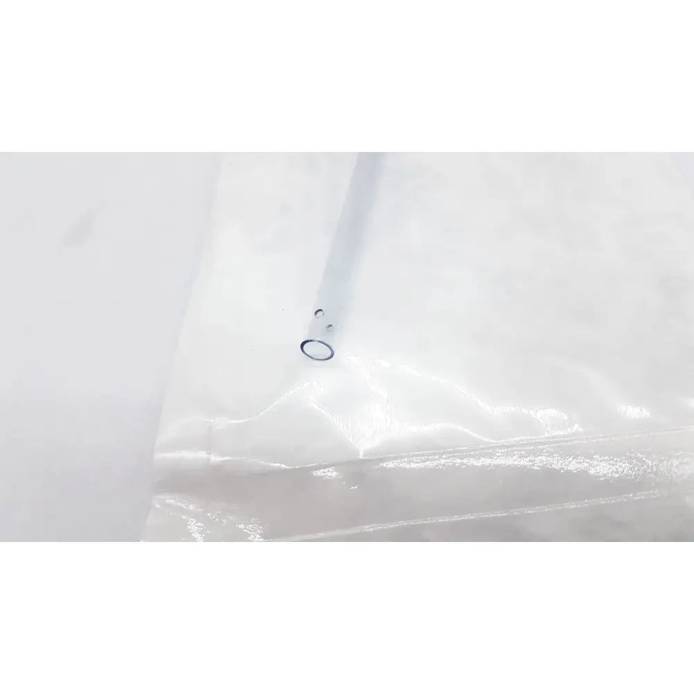 A clear plastic vacuum-sealed bag with black circular seal containing conmed suction instrument exp 12/2028