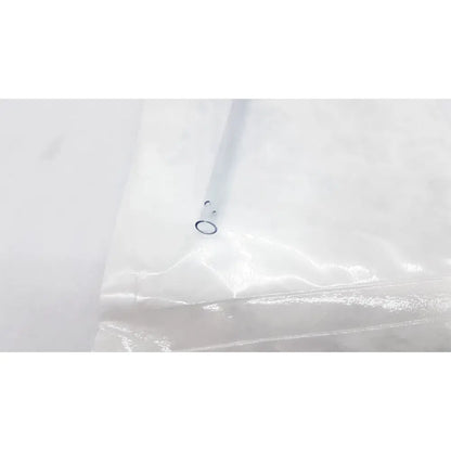 A clear plastic vacuum-sealed bag with black circular seal containing conmed suction instrument exp 12/2028