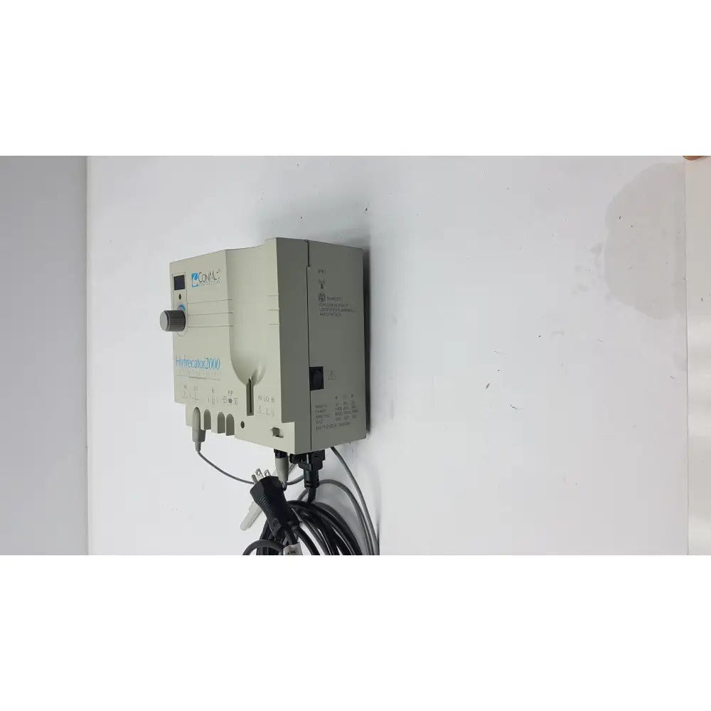 Beige industrial-grade variable frequency drive unit conmed 2000 with hydrecord 2000 control knob for reuse medical equipment