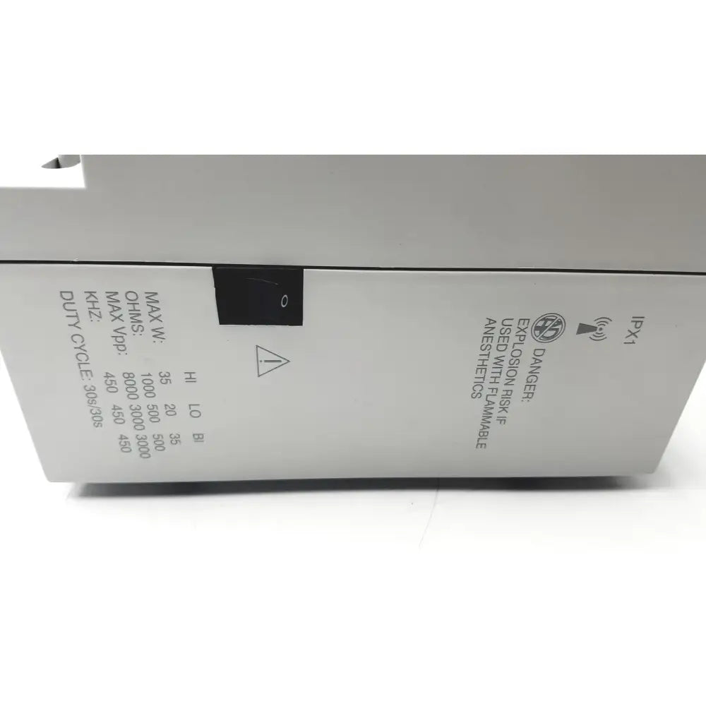 White rectangular conmed hyfrecator 2000 electrosurgical system box with black switch and safety labels for reuse medical use