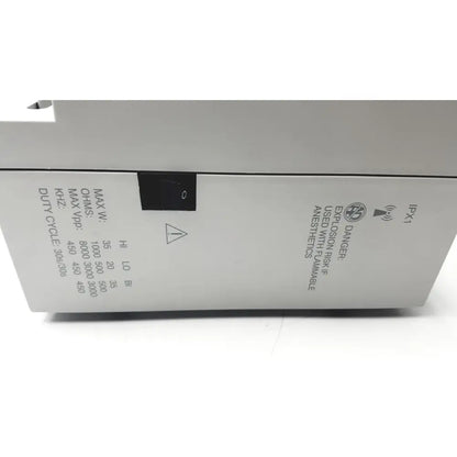 White rectangular conmed hyfrecator 2000 electrosurgical system box with black switch and safety labels for reuse medical use