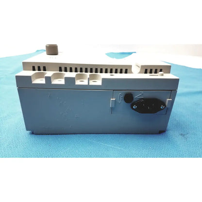 Gray plastic conmed hyfrecator 2000 high frequency control system panel with black power connector and beige ventilation slots