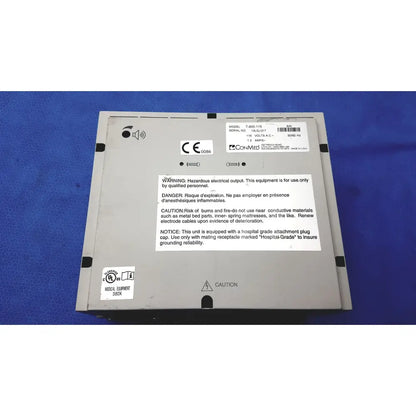 Gray rectangular conmed hyfrecator 2000 high frequency unit medical device with model number t-802-116 and safety warnings