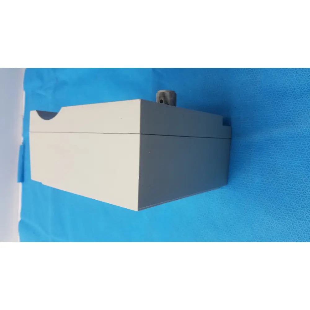 Gray rectangular conmed hyfrrecator 2000 electronic enclosure with textured gray knob for reuse medical applications g-bbde3c1-90w