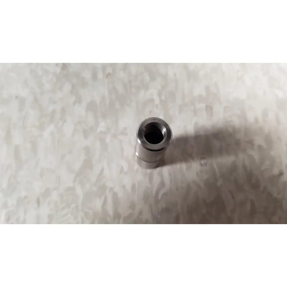 Silver metallic cylindrical connector with threaded interior on the back side of conmed im4123 true hd 1080p urology camera head