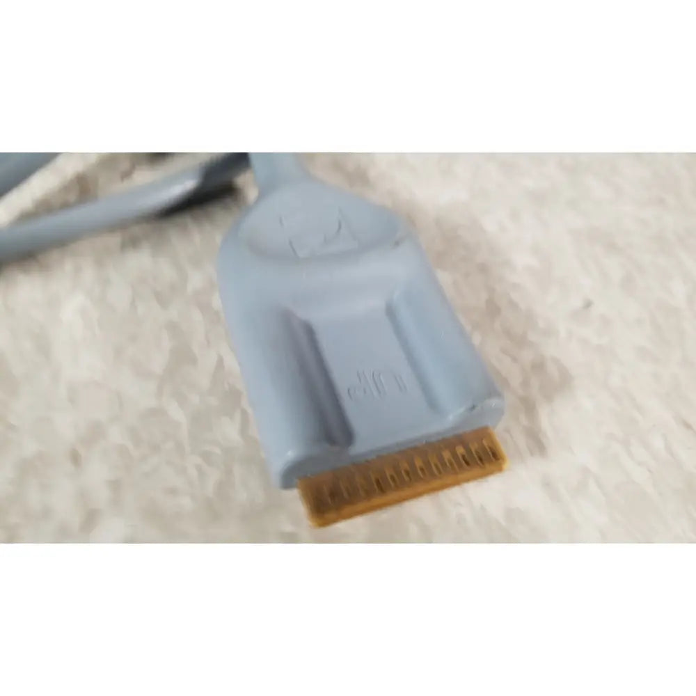 Gray plastic dvi connector with gold-colored pins on the back of conmed im4123 true hd 1080p urology camera head