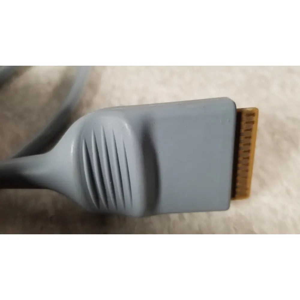 Gray plastic dvi connector with gold-colored pins on the back of the conmed im4123 true hd 1080p urology camera head