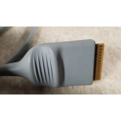 Gray plastic dvi connector with gold-colored pins on the back of the conmed im4123 true hd 1080p urology camera head