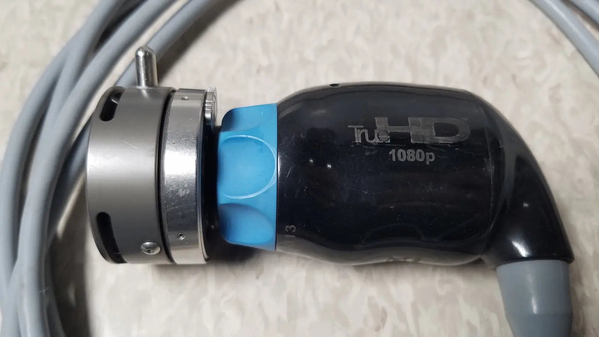 Black and blue conmed im4123 true hd 1080p autoclavable urology camera head with silver metallic connector