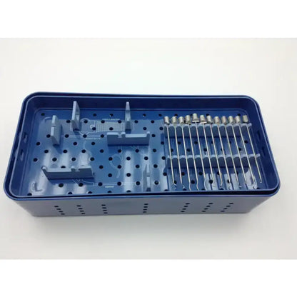 Blue plastic surgical instrument tray with metallic dental tools for tissue repair in conmed linvatec spectrum ii system