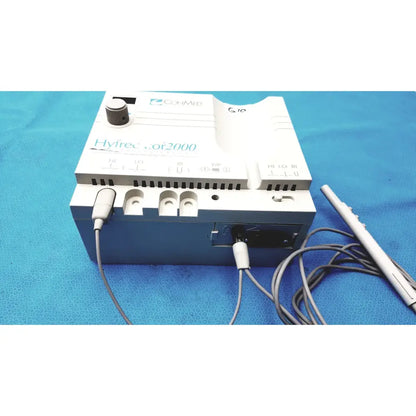 White and blue Conmed Model 2000 high frequency equipment with gray cables and silver-handled probe for medical use