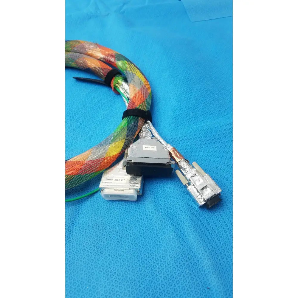 Connector stbu to egse cable featuring a colorful braided rainbow pattern with durable metallic connectors for reuse medical use