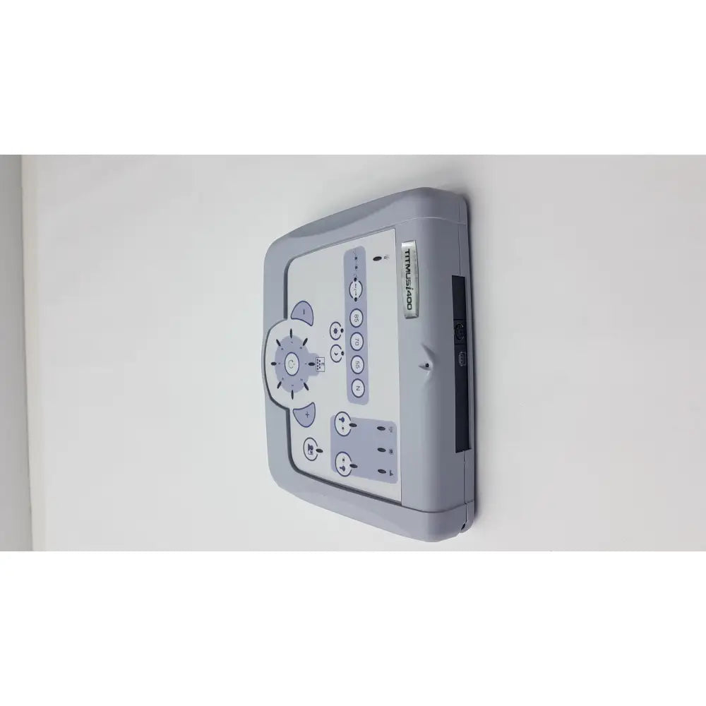 Gray plastic control panel for titmus i400 vision screener featuring buttons and a dial for device operation