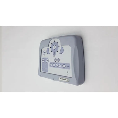 Gray plastic wall-mounted control panel with white display and dials for titmus i400 vision screener use
