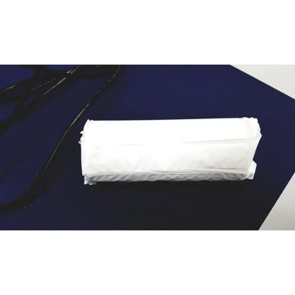 A neatly rolled white fabric item wrapped in clear plastic for lumax ts pro fiberoptic cystometry by cooper surgical