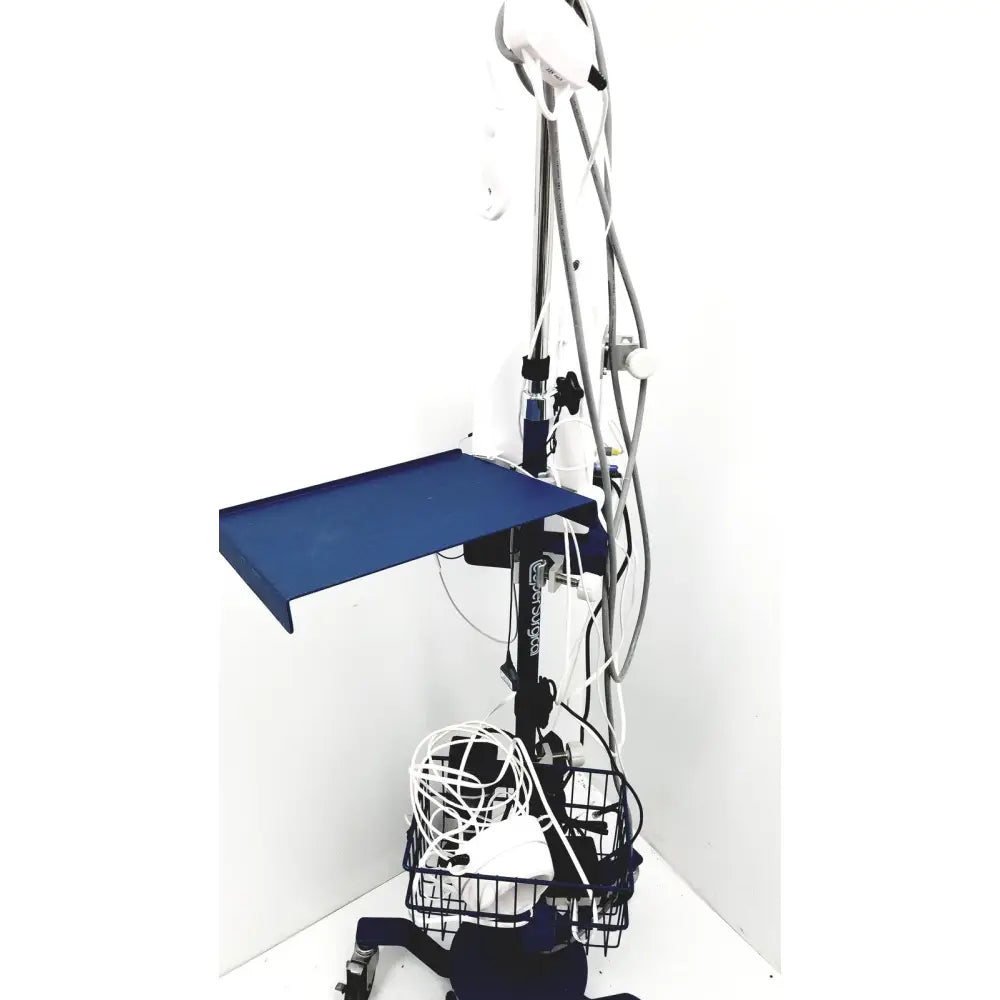 Blue metal examination table with adjustable height and cable management in cooper surgical lumax ts pro fiberoptic cystometry system