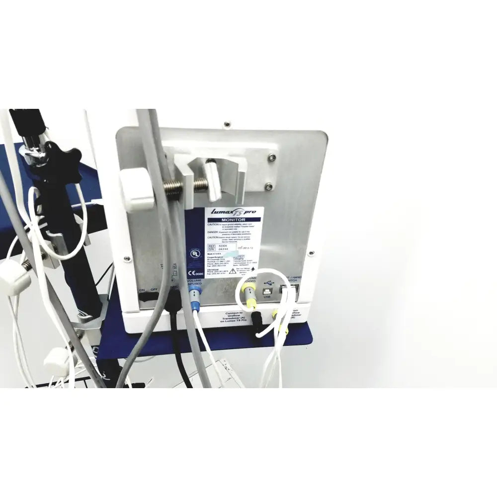 Rear view of cooper surgical silver metallic lumax ts pro fiberoptic cystometry monitor with white and blue cables connected