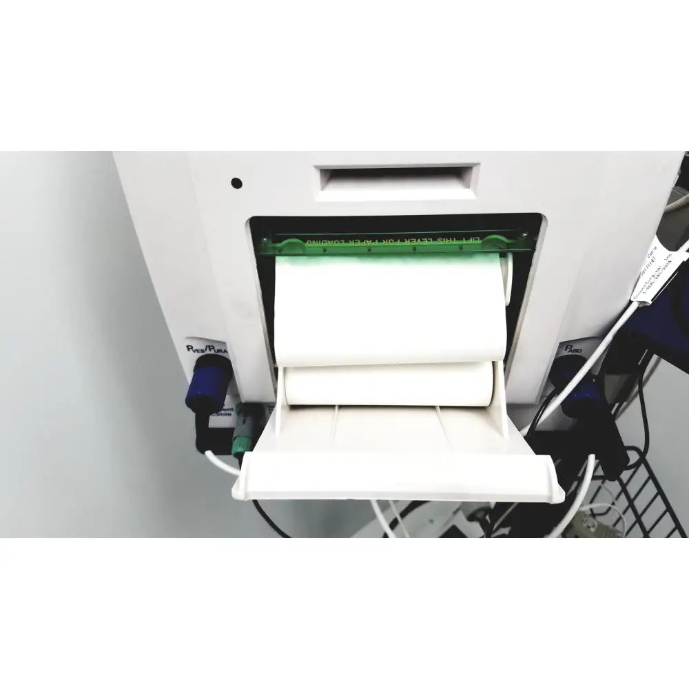 White receipt printer with green paper guide and two white thermal paper rolls for cooper surgical lumax ts pro fiberoptic cystometry system