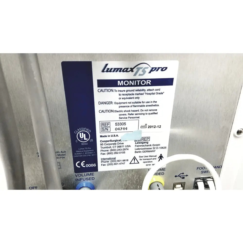 Label of cooper surgical lumax ts pro fiberoptic cystometry system with model 53305 serial 04744 on blue background