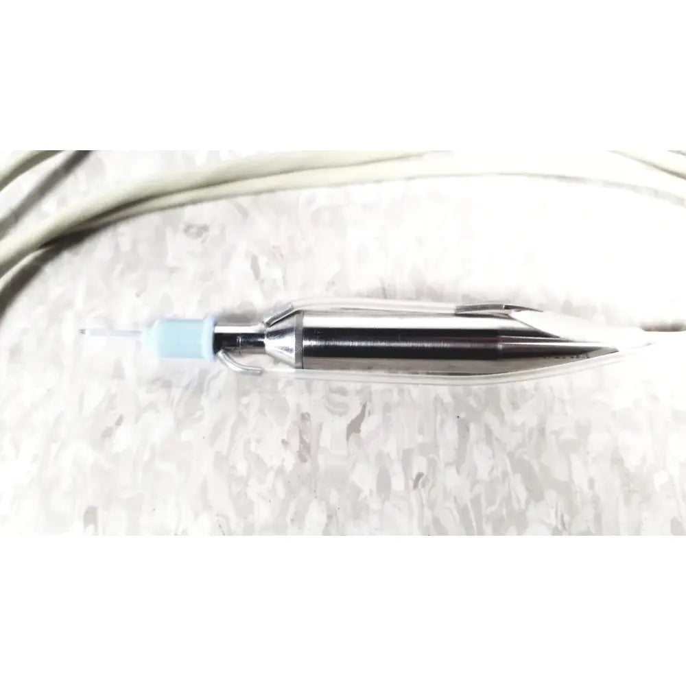 Silver metal cooper vision unipak handpiece needle with blue tip in transparent case for alcon phacoemulsifier