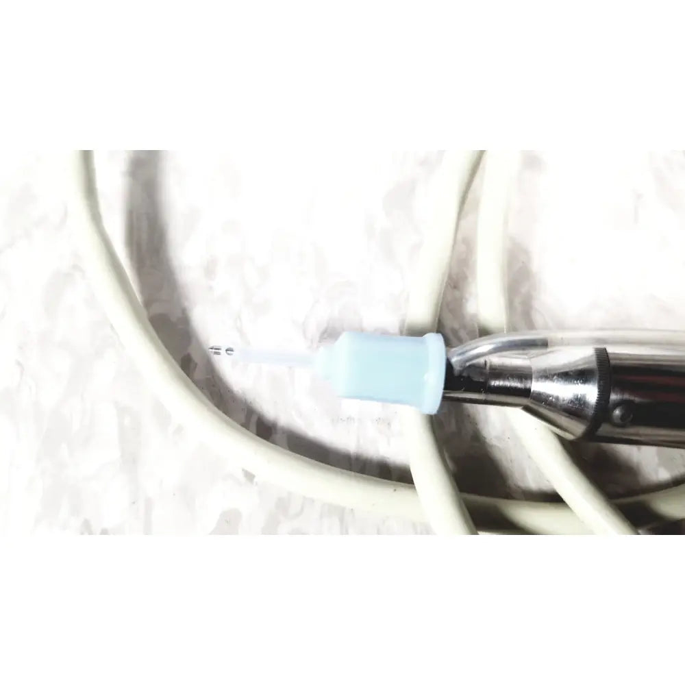 Cooper Vision 390 unipak handpiece with metallic body, light blue tip, and black grip for Alcon phacoemulsifier with case