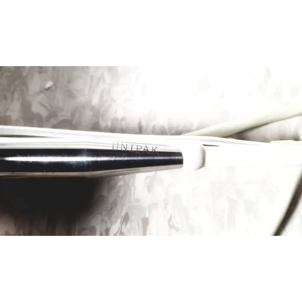 Black and white cooper vision unipak handpiece with sleek metallic finish for alcon phacoemulsifier with case