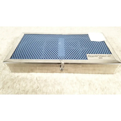 Silver rectangular cooper vision 390 unipak handpiece box with blue perforated lid for alcon phacoemulsifier