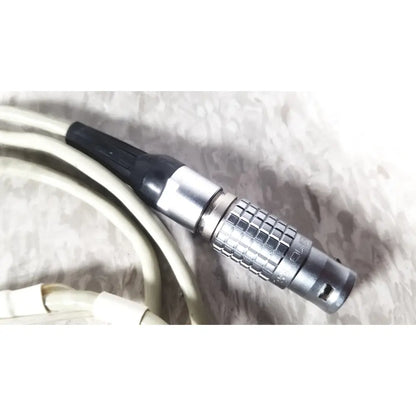 Silver cooper vision 390 unipak handpiece with black plastic tip for alcon phacoemulsifier showing textured body