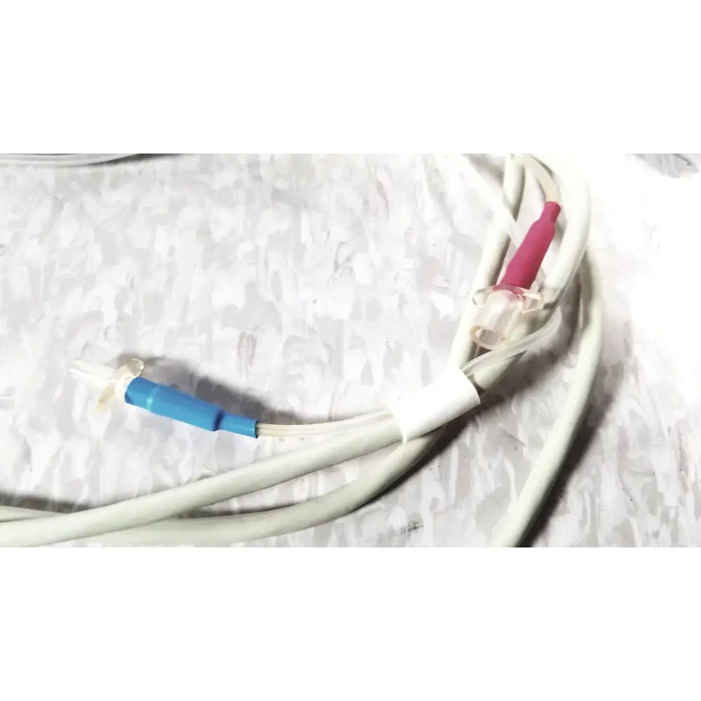 White medical tubing with blue and pink connectors of cooper vision 390 unipak handpiece for alcon phacoemulsifier