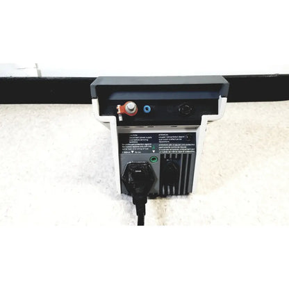 Black and white power supply unit with red terminal blue port green indicator light and black plug for corning meter 120v 60hz