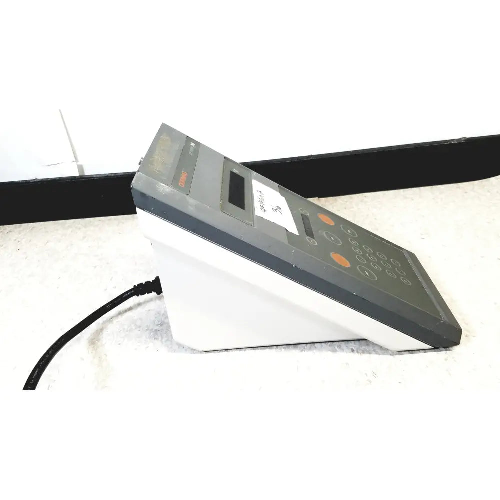 Gray and white countertop cash register with orange buttons for corning 245 ph meter 120v 60hz reuse medical use