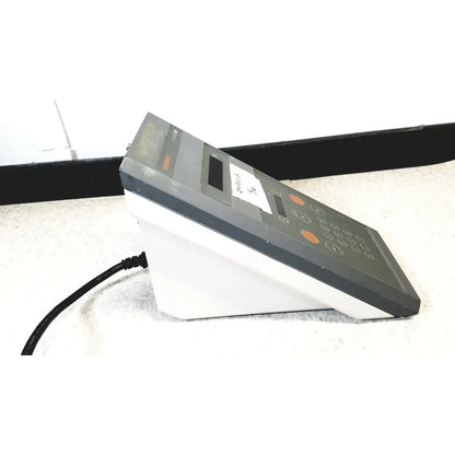 Gray and white countertop cash register with orange buttons for corning 245 ph meter 120v 60hz reuse medical use