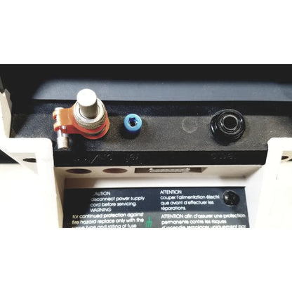 Orange and silver adjustable knob with blue plastic cap on black panel at back of corning 245 ph meter 120v 60hz