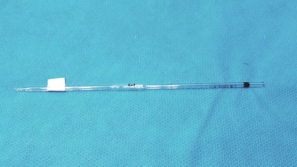 Clear glass corning pyrex 3ml reusable glass volumetric pipette with black rubber stopper and white label at the top