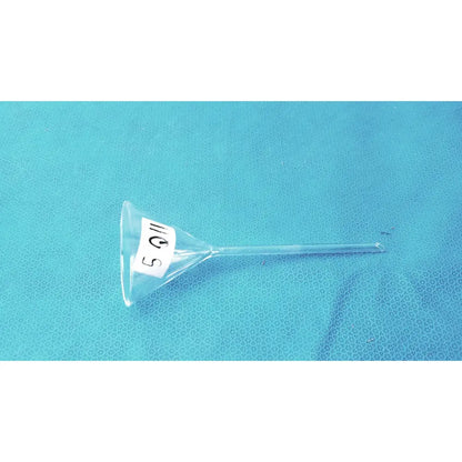 Clear plastic corning pyrex fluted funnel with white 5 q label and long stem lab glassware for precise pouring
