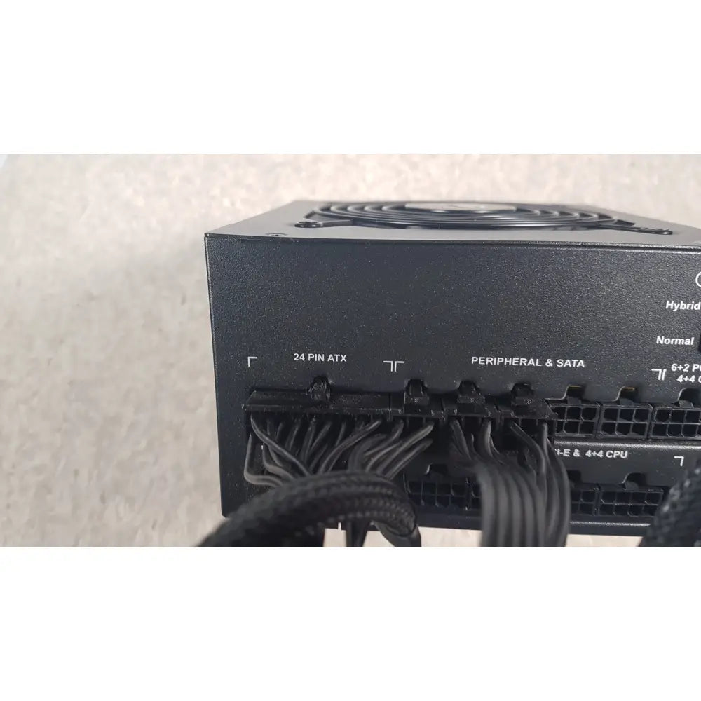 Black corsair ax760 760w fully modular power supply with multiple cable connectors and top fan for efficient cooling