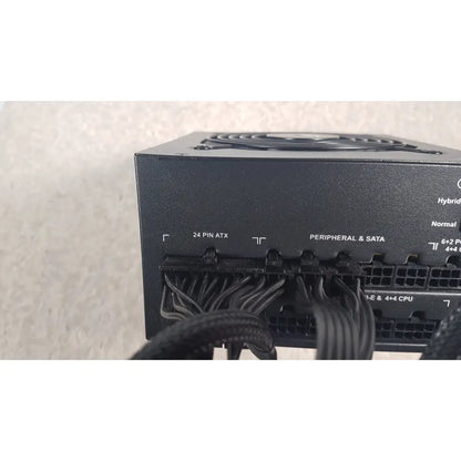 Black corsair ax760 760w fully modular power supply with multiple cable connectors and top fan for efficient cooling