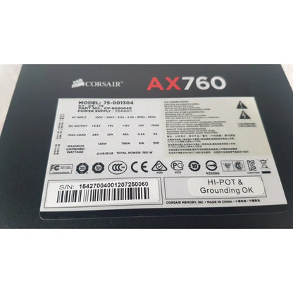 Black corsair ax760 760w fully modular power supply unit with white labeling and specifications visible on the back side