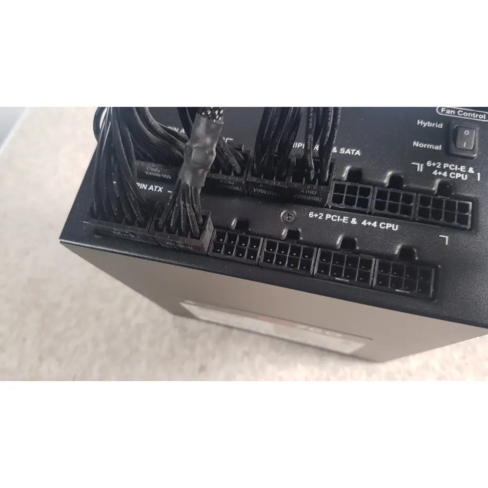 Black plastic fully modular power supply with multiple cable connectors and fan control switch corsair ax760 760w model