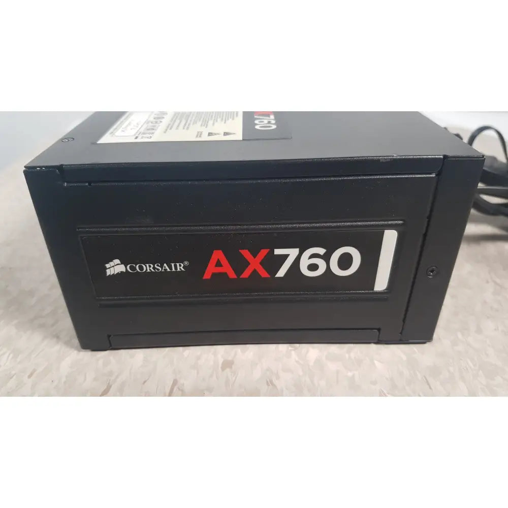Black corsair ax760 760w fully modular power supply with red and white branding for efficient PC power management