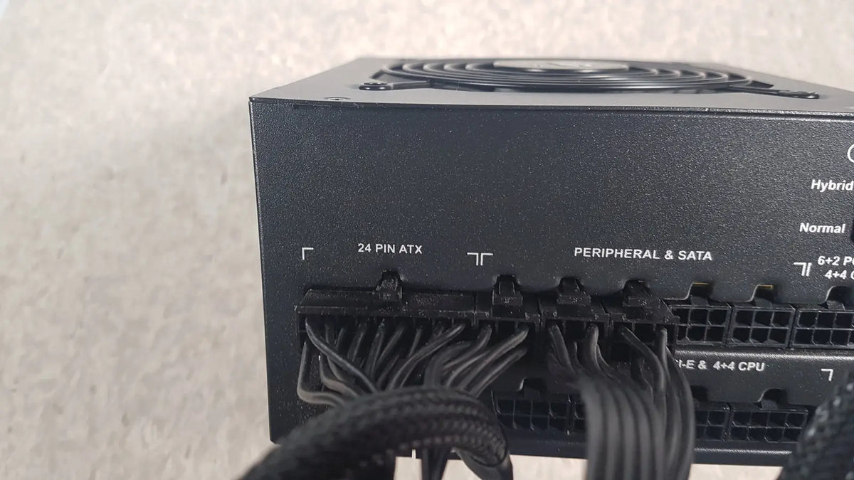 Black corsair ax760 760w fully modular power supply with multiple cable connectors and top fan for efficient cooling