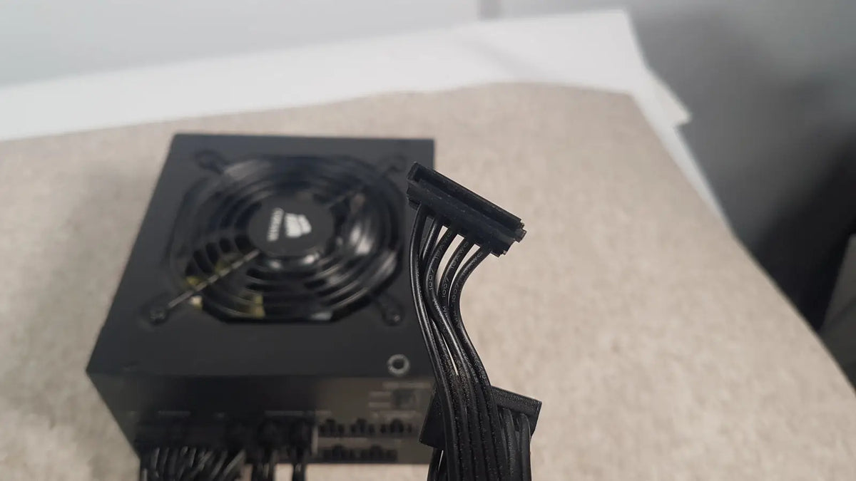 Black corsair ax760 760w fully modular power supply unit with fan and bundled cables for efficient power delivery
