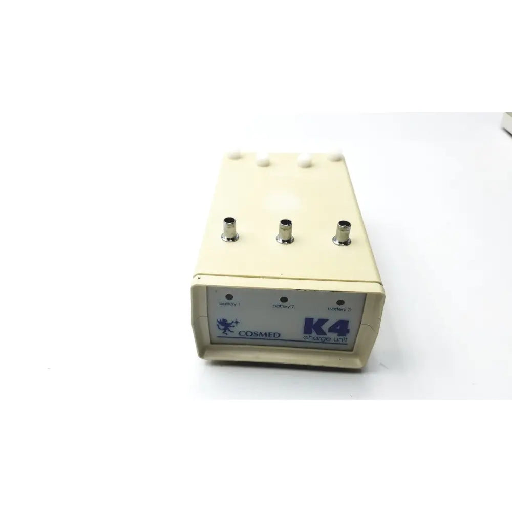 Cream-colored cosmed k4 b2 metabolic exercise monitor with three metallic ports and battery indicators for reuse medical use