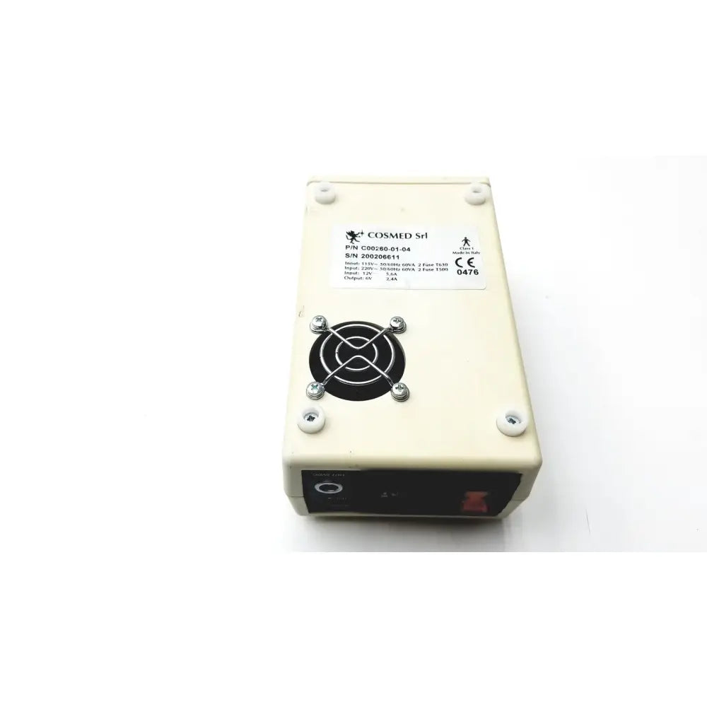 Cream-colored rectangular cosmed k4 b2 metabolic power supply unit with black fan grille and silver screws for reuse medical devices