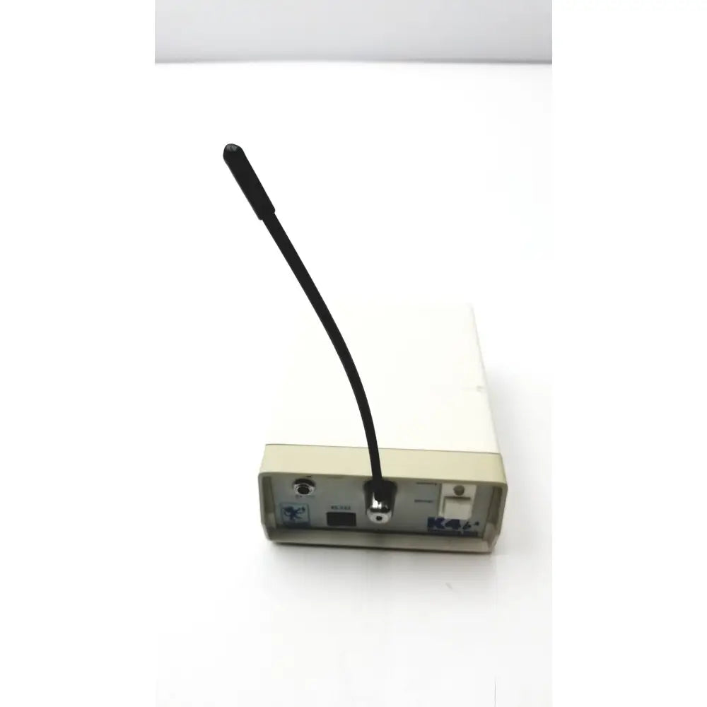Beige rectangular Cosmed K4 B2 metabolic electronic device with black flexible antenna for reuse medical applications