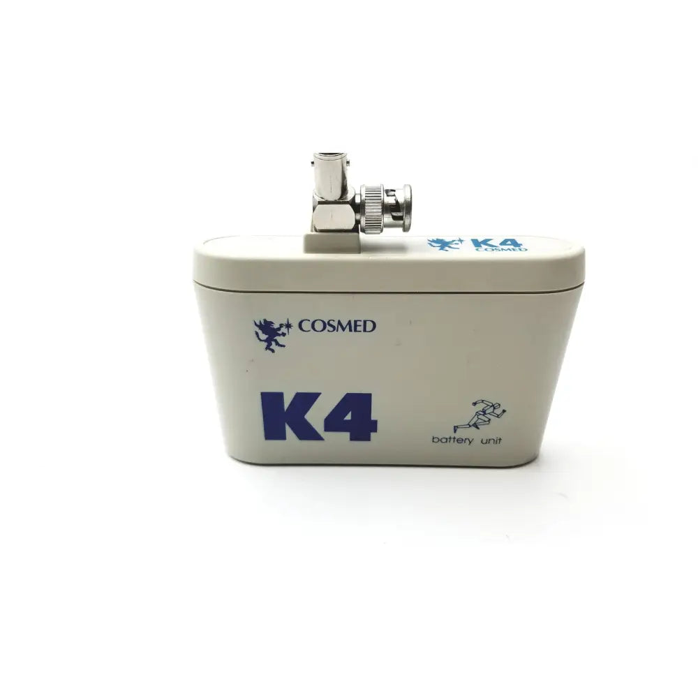 Cream-colored cosmed k4 b2 metabolic battery unit with blue branding and metallic bnc connector for reuse medical purposes
