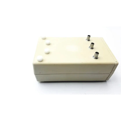 Cream-colored Cosmed K4 B2 metabolic electronic device with four white push buttons and three metallic ports for reuse medical use