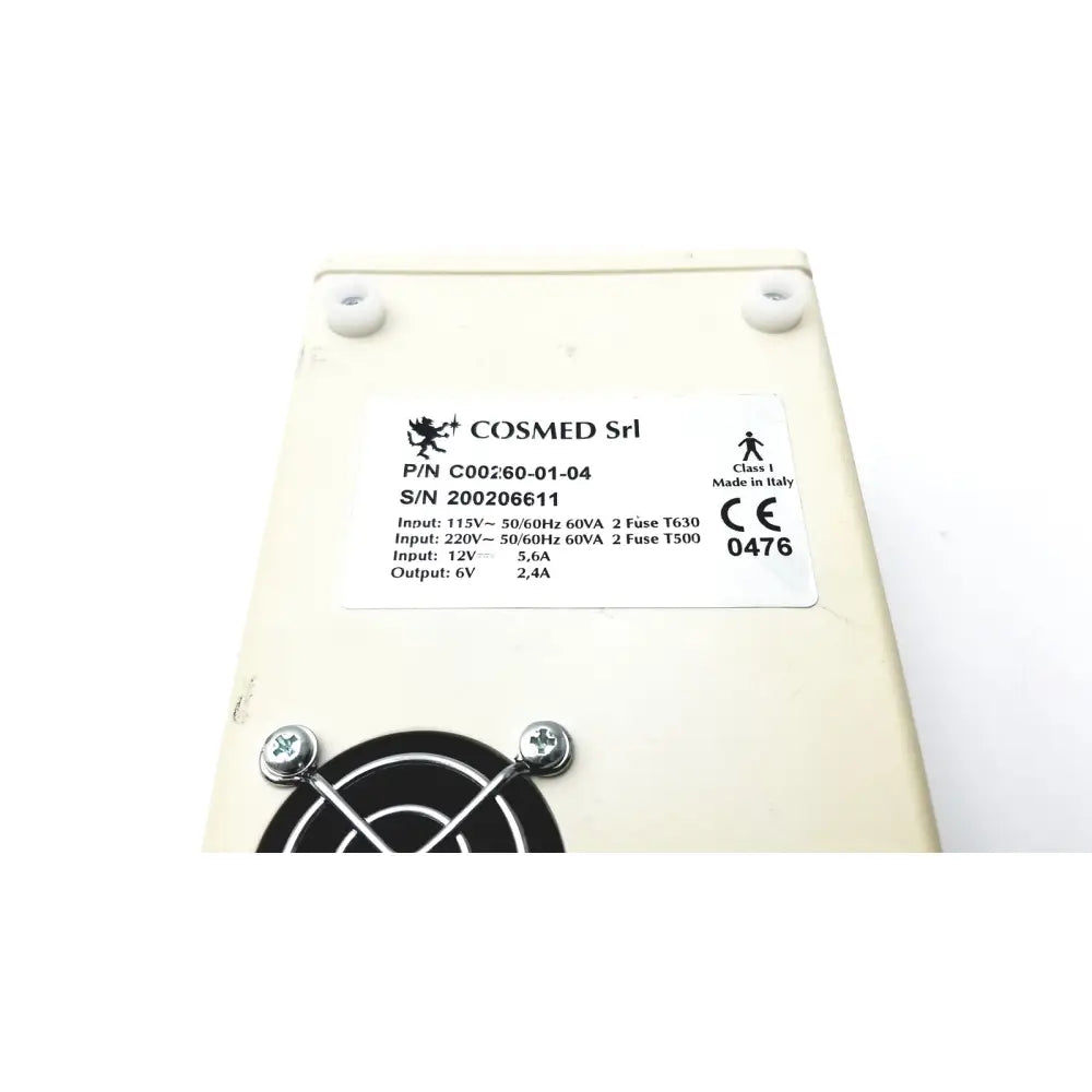 Cream-colored rectangular power supply unit for cosmed k4 b2 metabolic with technical specs label for reuse medical use