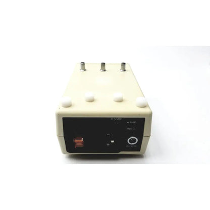Beige rectangular cosmed k4 b2 metabolic power supply unit with black panel, silver ports, red switch for reuse medical use